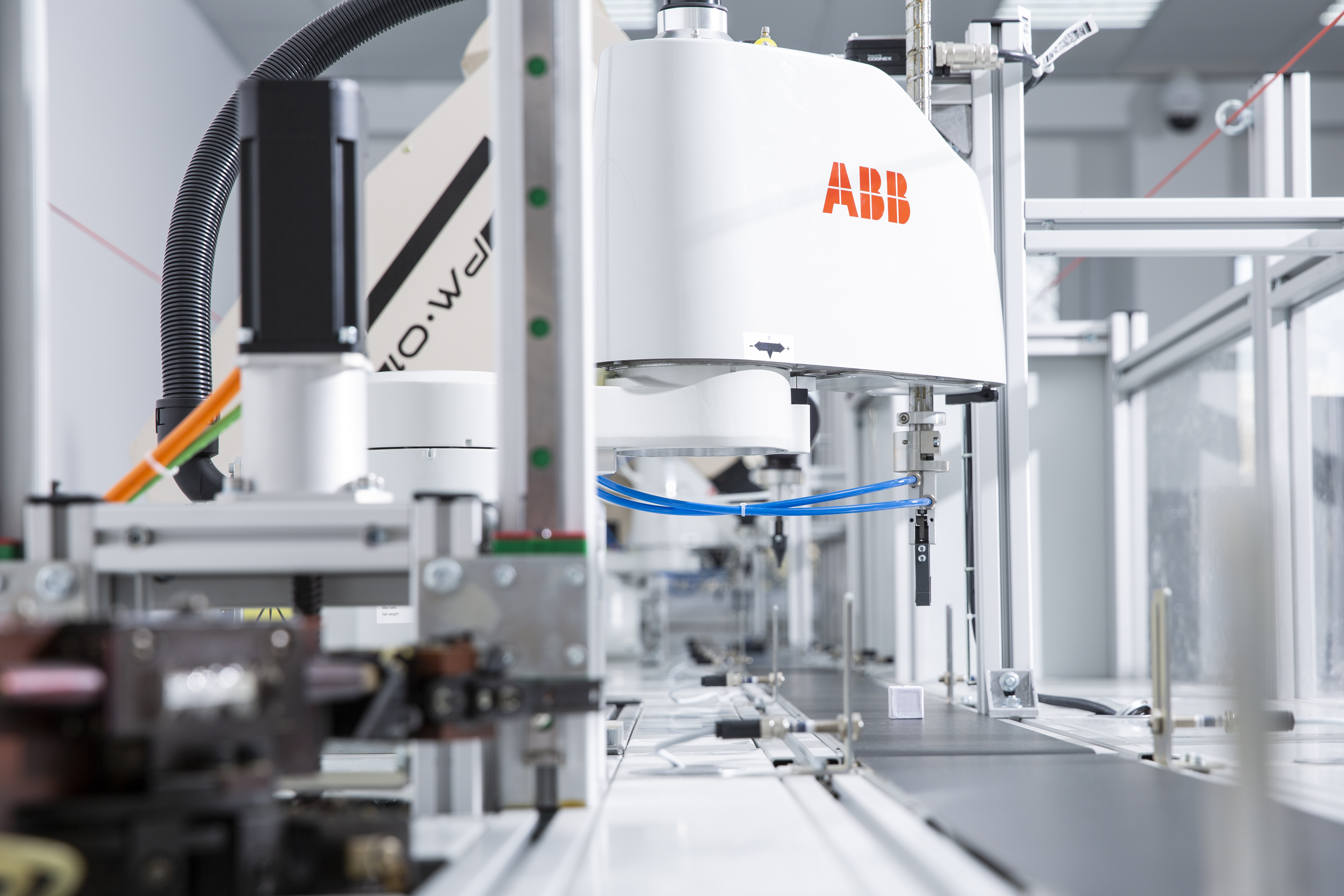 Mechatronics laboratory with industrial robotic arms